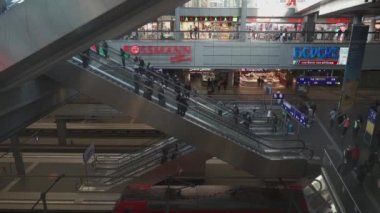 March 11, 2022. Berlin. Germany. Main station interior. Berlin Hauptbahnhof. People inside Berlin Central train station. Deutsche Bahn. General railway terminal Inside passengers, people and trains. 