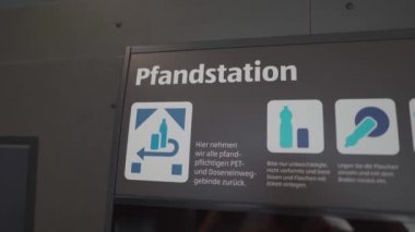 September 10, 2022. Munich. Germany. Pfandstation in Aldi supermarket. Bottle pickup and disposal vending machine in supermarket. Polyethylene terephthalate. PET. Refunds for bottles in automat. 