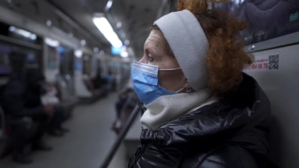 Mature Woman Medical Protective Mask Traveling Subway Train Concept New — Stockvideo