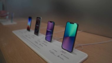 September 16, 2022, Munich, Germany. Showcase iphone 13 in munchen germany at marienplatz Rosenstrasse. Comparison of iPhones from Apple. Modern mobile phone technology concept. Retail iPhone 13