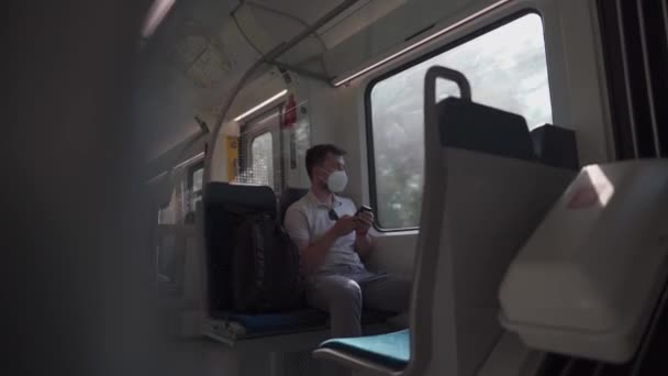 Tourist Passenger Train Germany Using Smartphone Application Wearing Protective Mask — Vídeo de Stock