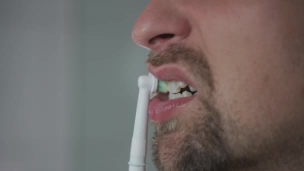 Man Brushes His Teeth Electrical Tootbrush Morning Bathroom Work Male — Stock video