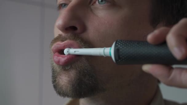 Man Brushes His Teeth Electrical Tootbrush Morning Bathroom Work Male — 비디오
