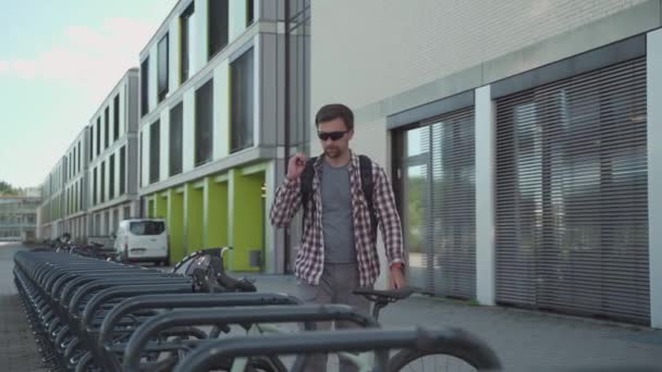 Man Cyclist Unlocks Bicycle Bike Parking Lot Germany Male Opens — Wideo stockowe