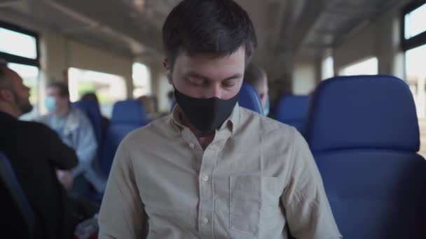 Masked Man Use Disinfectant Gel While Traveling Train Travel Safely — Stock Video