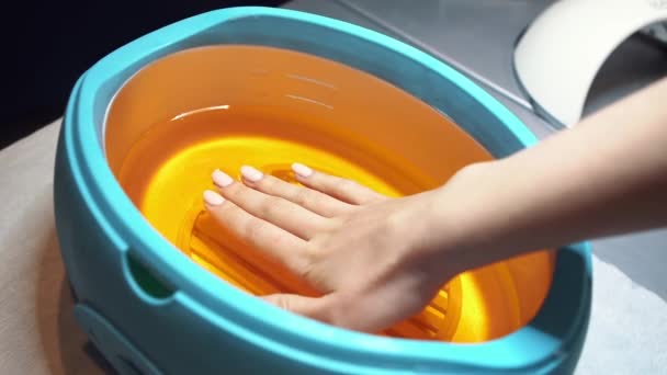 Paraffin Bath Spa Salon Manicure Process Paraffin Treatment Female Hand — Stock Video