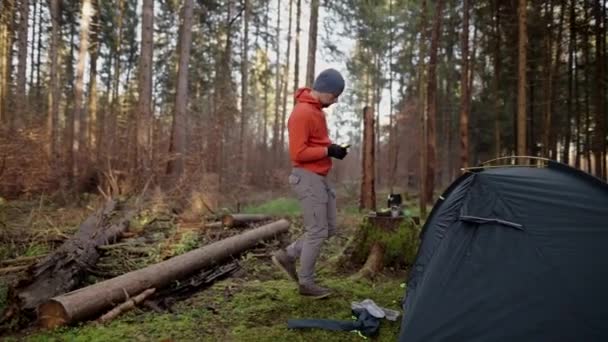 Man Hiker Sets Camping Tent Fall Forest Backpacking Expedition Traveler — Stockvideo