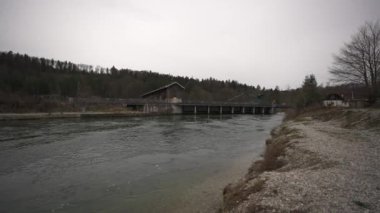 Bayerbrunn hydropower power dam fishing ladder. Fish stairs and weir on the Isar River near Munich, Germany. Vogelschutzgebietz. Grunwald. Dam on the Isar River in southern Bayern with fish stairway. 