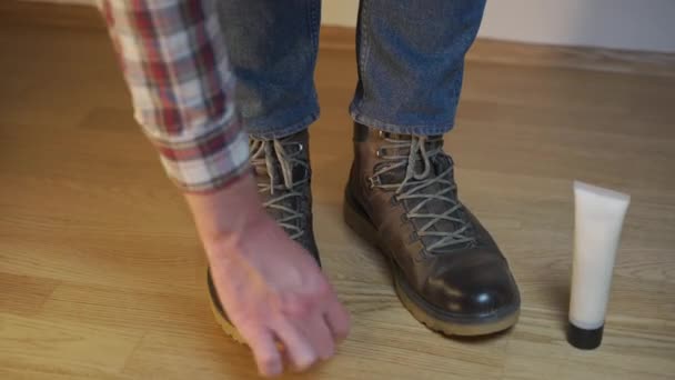 Unrecognizable Man Cleans Brown Leather Boots Brush Lubricates Cream Blotting — Stock Video
