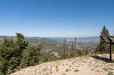 Stunning views of mountains and lakes on a sunny summer day from atop Bald Mountain in Deer Valley Resort. A high-quality photo taken in Parky City, Utah. clipart