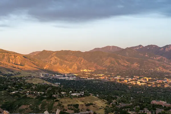 stock image Stunning sunset views of the Salt Lake Valley and the Wasatch Range from atop Ensign Peak. A high-quality photo taken in Salt Lake City, Utah.