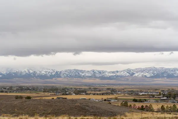 stock image A stunning scenic view of the Stansbury Mountain range on a cloudy day taken from Bates Canyon Trailhead. A high-quality photo taken near Tooele, Utah.