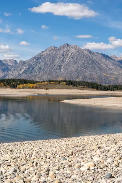 stock image A stunning view of the Teton mountain range during Golden Hour and on a Sunny day with no people present. A high-quality photo taken in Grand Teton National Park, Wyoming