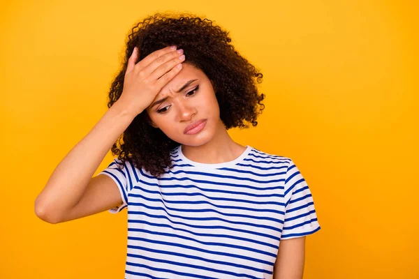 Photo of unhappy sad upset lady wear white t-shirt arm forehead isolated yellow color background.
