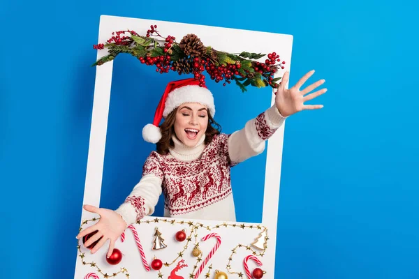 Photo of positive cute lady eyes closed wear trendy ugly jumper inside picture snapshot window isolated on blue color background.
