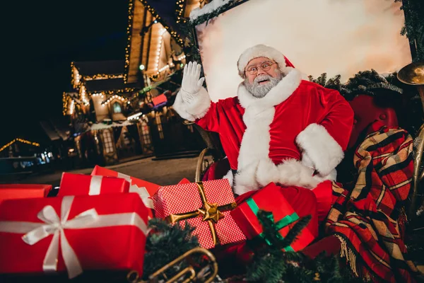 Photo Positive Bearded Santa Claus Sit Sleigh Raise Hand Wave — Stock Photo, Image