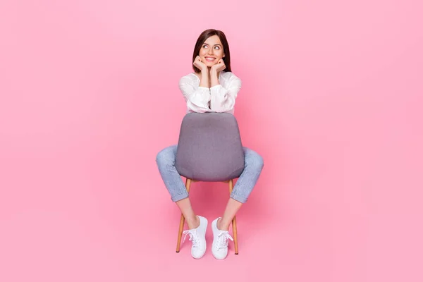 Full length photo of positive minded lady interested look empty space trendy clothes black friday sale isolated pink color background.