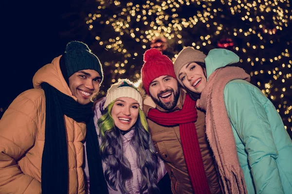 stock image Photo of company funny positive fellows toothy smile festive event garland decoration town center outside.