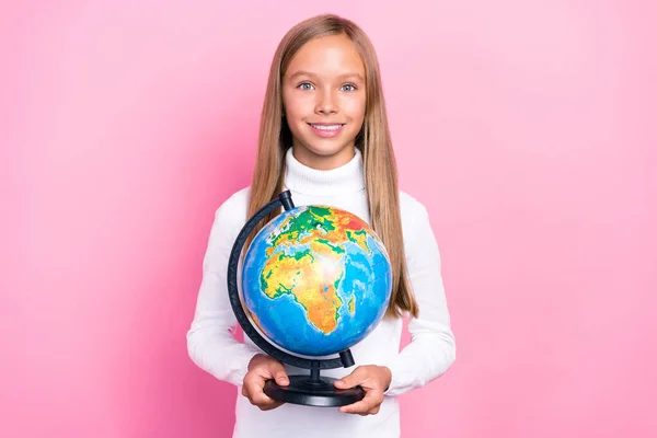 stock image Portrait of positive cheerful girl toothy smile arms hold globe isolated on pink color background.
