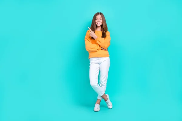 Stock image Full body size photo of young child girl wear stylish outfit finger point new shopping proposition cheap clothes isolated on cyan color background.