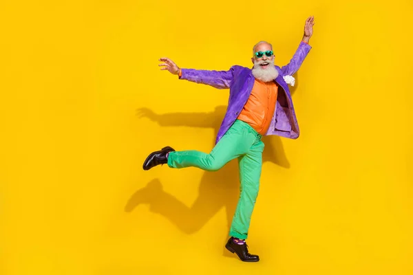Full size photo of nice grandparent hipster club festive theme party dressed stylish colorful outfit isolated on yellow color background.