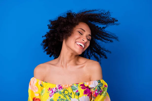 stock image Photo of adorable cute lady wear yellow top smiling dancing empty space isolated blue color background.