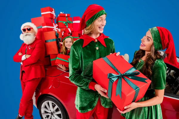 Photo Positive Cheerful Santa Claus Helpers Wear Costumes Riding Red — Stock Photo, Image