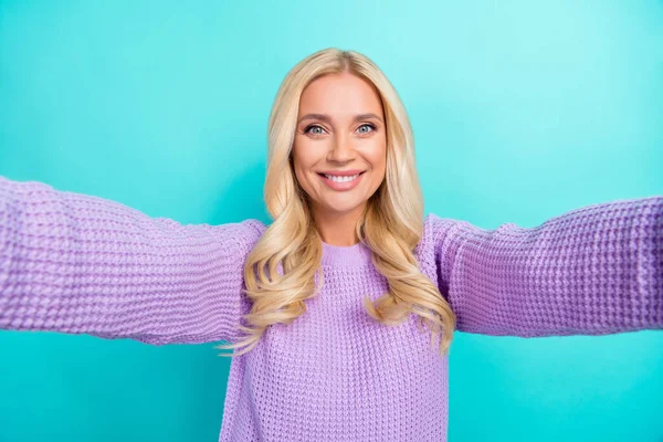 Closeup selfie photo portrait of young attractive bleaching smile lady popular vlog star take shot video record isolated on cyan color background.