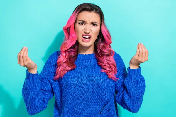 Portrait of dissatisfied aggressive furious woman wear knit pullover screaming bad situation isolated on vibrant teal color background.
