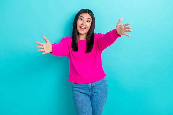 Photo of excited funny friendly person vietnamese lady wear stylish outfit want hug everyone look you isolated on aquamarine color background.
