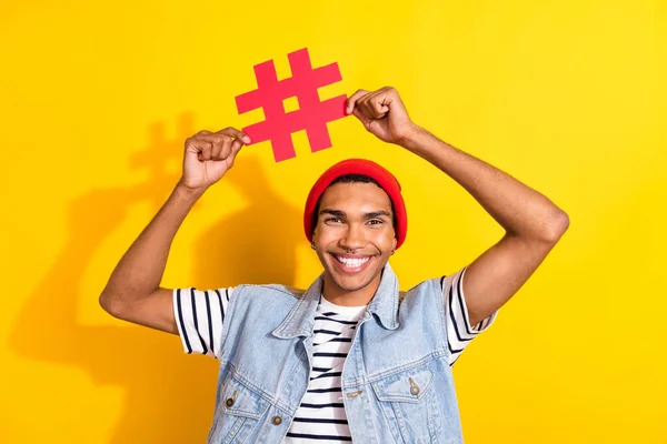 Photo Glad Optimistic Man Blogger Wear Trendy Clothes Showing Hashtag — Stock Photo, Image