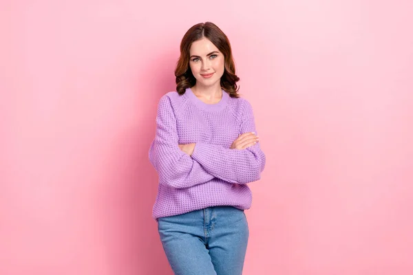 Photo of cute sweet lovely lady wear warm knitted clothes arm folded promoting new collection empty space isolated on pink color background.