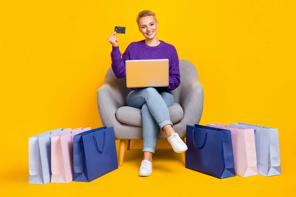 Full Length Photo Cheerful Person Sit Chair Hold Debit Card —  Fotos de Stock