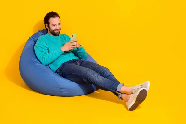 Full Length Photo Dreamy Positive Guy Teal Outfit Sitting Bean — Fotografia de Stock