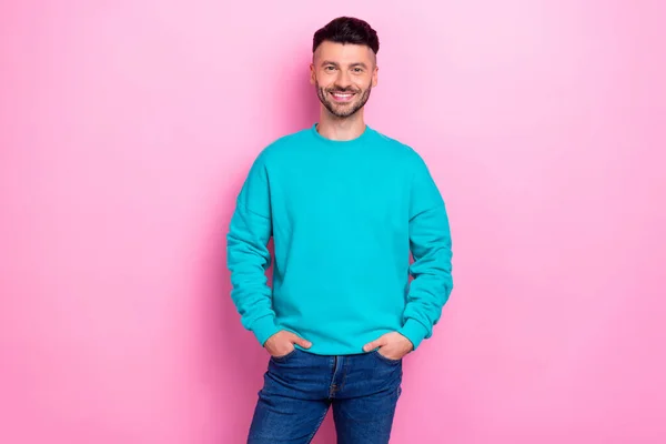 Photo Young Cheerful Satisfied Guy Wear Blue Jumper Hands Pockets — Stock Photo, Image