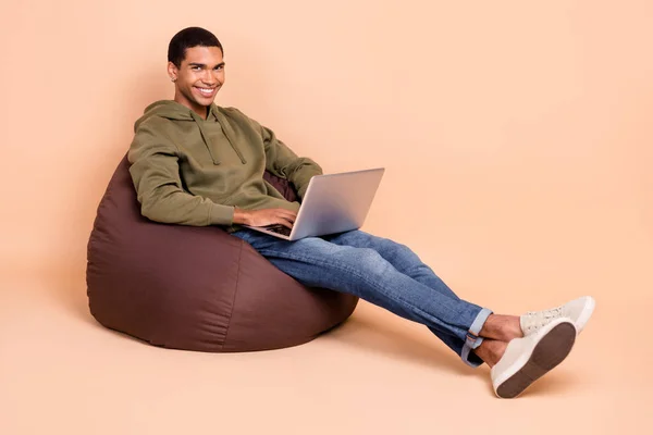 Full Length Photo Positive Clever Man Sit Bag Use Netbook —  Fotos de Stock