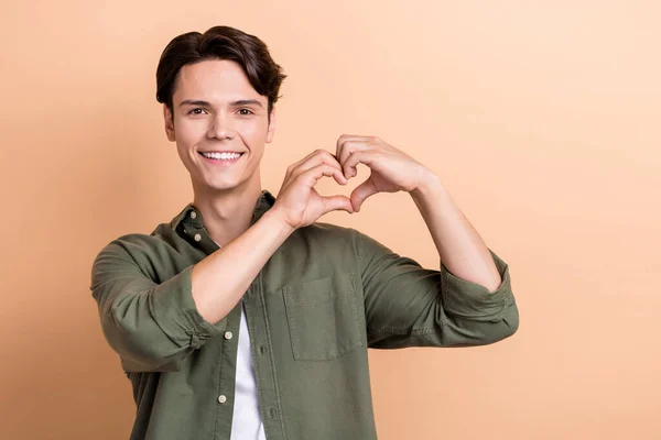 Photo Young Positive Student Guy Showing Fingers Love Symbol Enjoy — Foto Stock