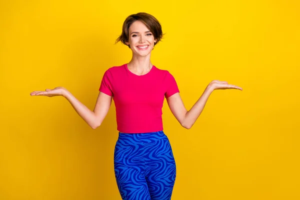 Photo Adorable Cheerful Woman Dressed Pink Shirt Comparing Arms Empty — Stock Photo, Image