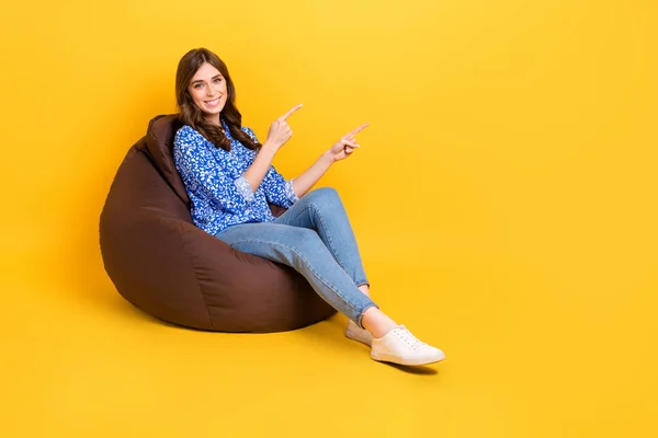 Full Size Portrait Positive Nice Girl Sit Comfy Bag Indicate — Stockfoto