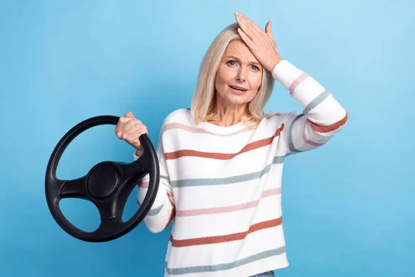 Photo of sad upset lady wear striped pullover having driving car problem trouble isolated blue color background.