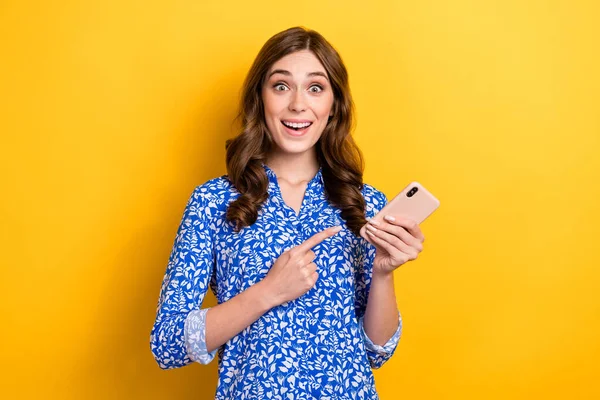 Photo Cute Excited Woman Dressed Blue Blouse Pointing Finger Modern — Stok fotoğraf