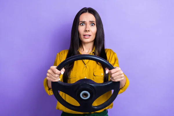Photo of funny worried nervous stressed depressed lady wear trendy clothes first time drive own car isolated on purple color background.