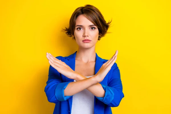 Photo of strict boss lady leader cross arms show sop warning symbol isolated on vivid color background.