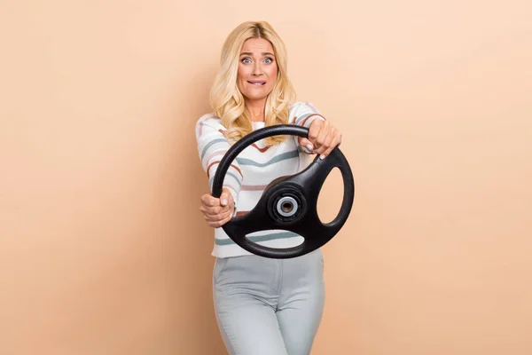 Photo Confused Woman Curly Hairstyle Striped Long Sleeve Hold Steering — Stockfoto