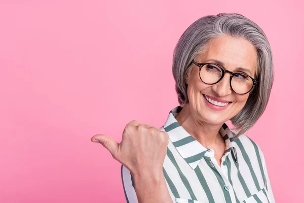 Photo Successful Retired Businesswoman Look Direct Finger Empty Space Satisfied — Stock Photo, Image