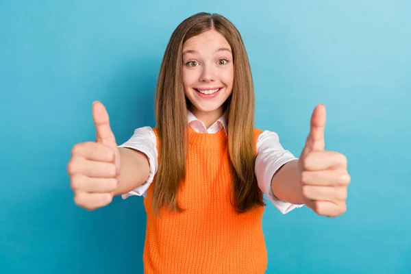 Photo of positive glad person beaming smile arms fingers show thumb up isolated on blue color background.