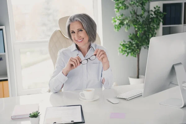 Photo Positive Successful Aged Lady Sitting Chair Arms Hold Eyeglasses — Stockfoto