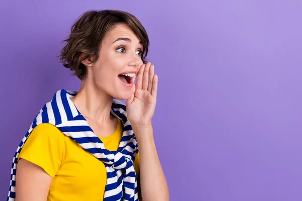 stock image Profile side photo of cheerful pretty lady wear trendy striped clothes look empty space share news isolated on purple color background.