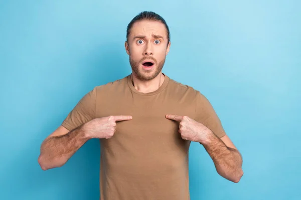 Photo of shocked questioned person open mouth staring point fingers himself isolated on blue color background.