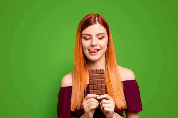 Young Red Haired Girl Holding Chocolate Bar Isolated Yellow Background — Stock Photo, Image